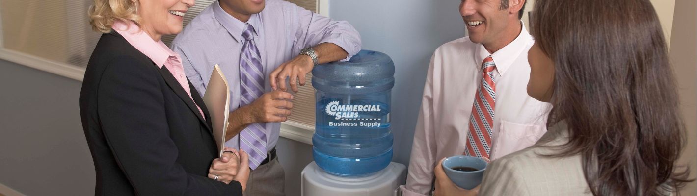 Office employee around a water cooler